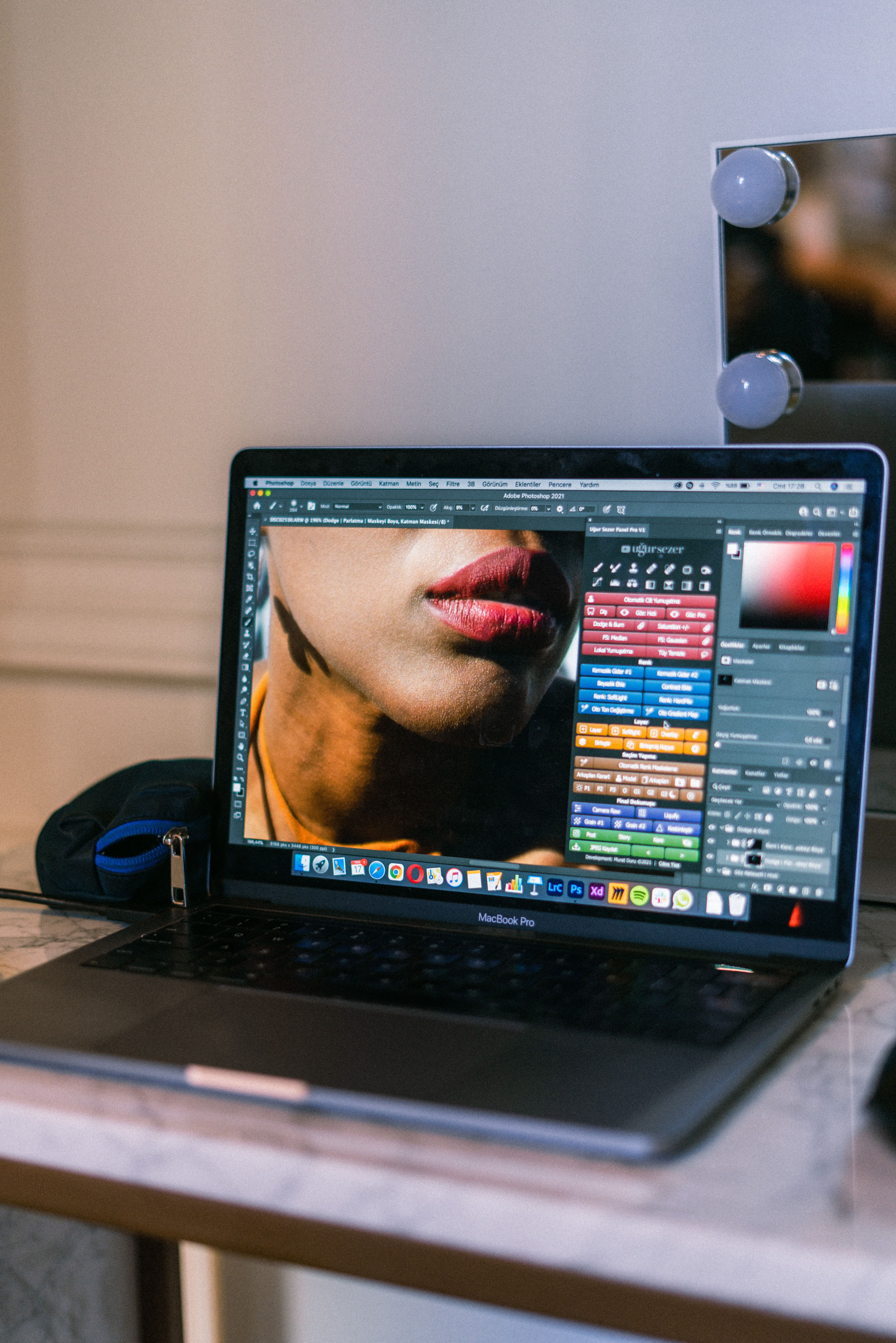 Laptop displaying a photo-editing application